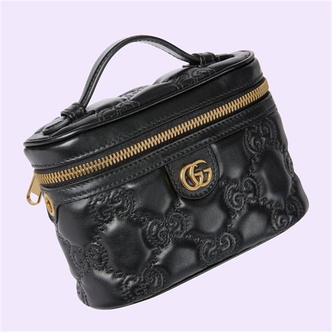 Gucci GG Matelassé top handle mini bag